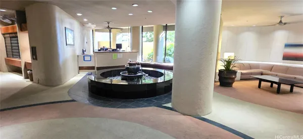 an aerial view of a house with a swimming pool