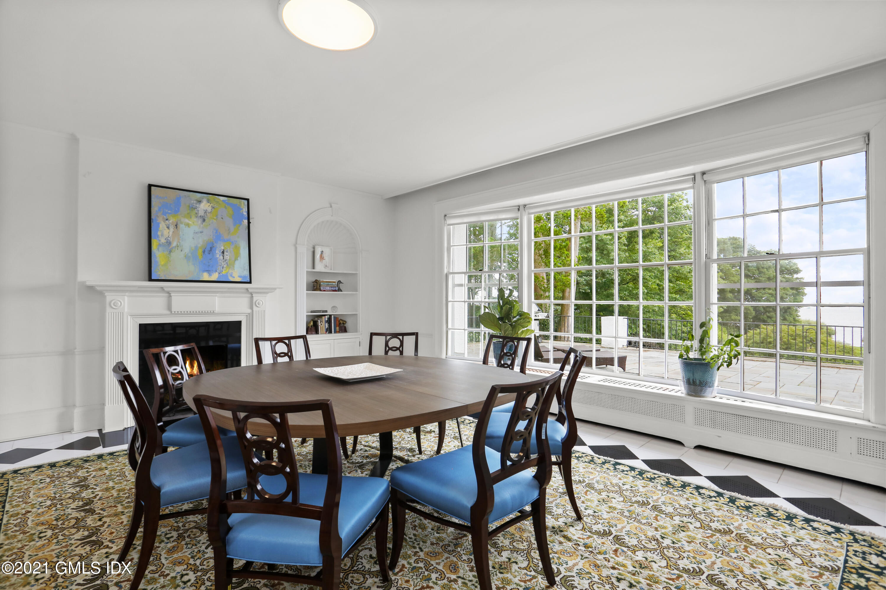 91 Indian Head Road Riverside, CT 06878 - Photo 11 of 45 a dining room with furniture and wooden floor