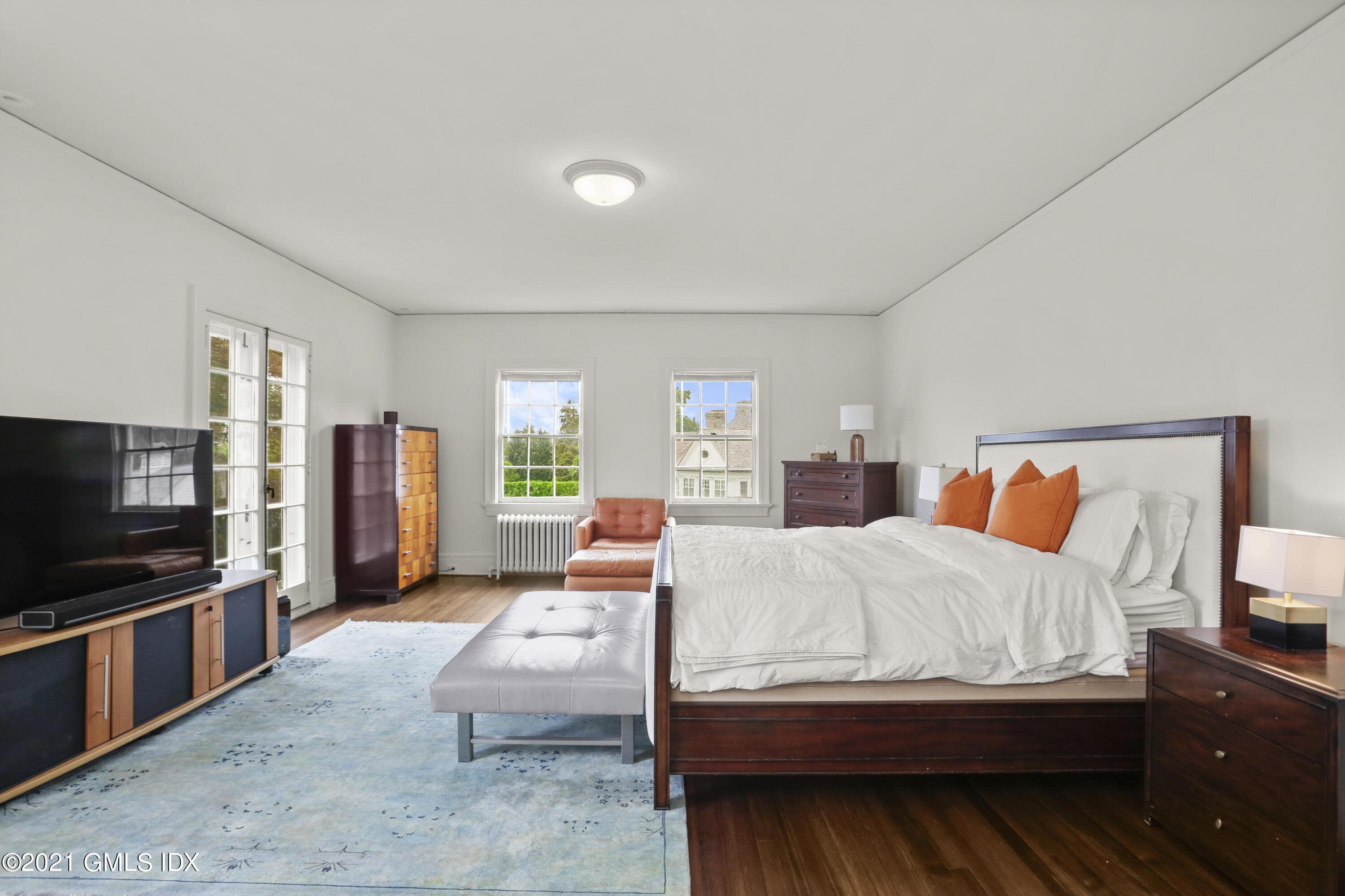91 Indian Head Road Riverside, CT 06878 - Photo 25 of 45 a bedroom with bed and window