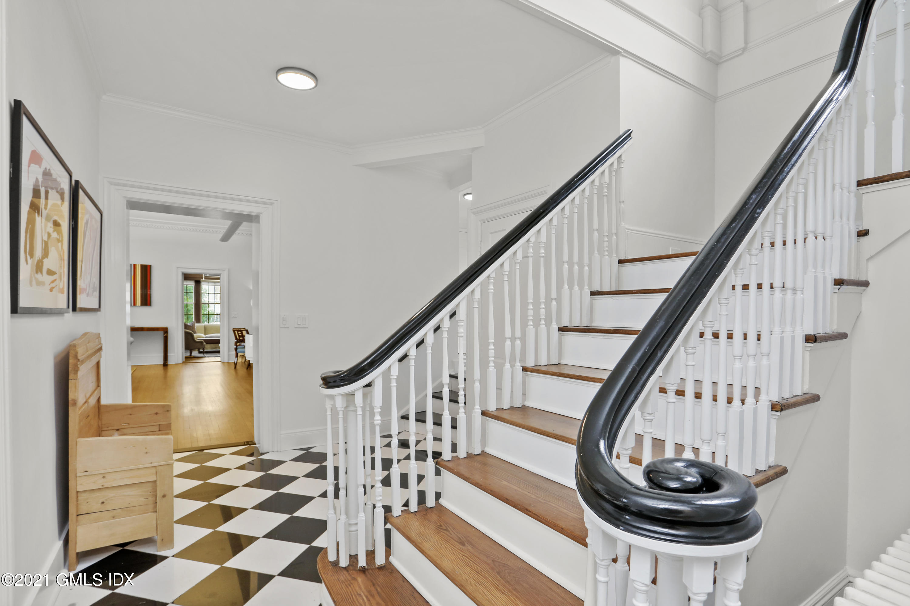 91 Indian Head Road Riverside, CT 06878 - Photo 5 of 45 a view of entryway and hall with wooden floor