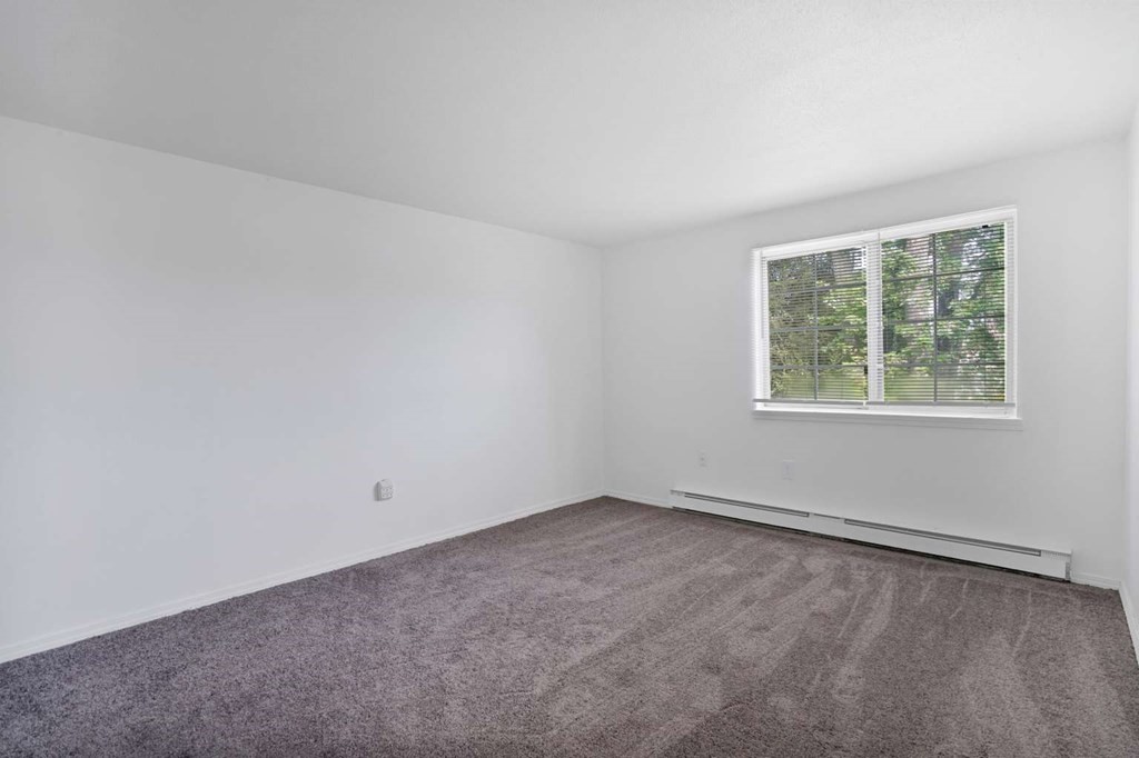 269 Chicopee Street, Unit 17 Chicopee, MA 01013 - Photo 12 of 19 an empty room with a window