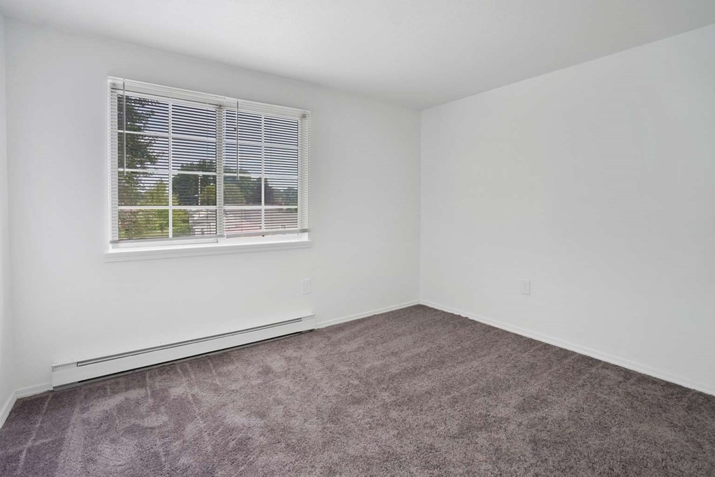 269 Chicopee Street, Unit 17 Chicopee, MA 01013 - Photo 14 of 19 an empty room with a window