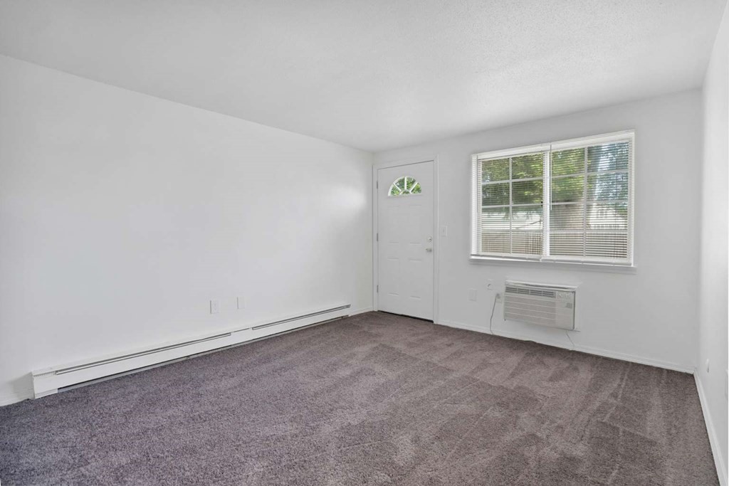 269 Chicopee Street, Unit 17 Chicopee, MA 01013 - Photo 8 of 19 an empty room with a window