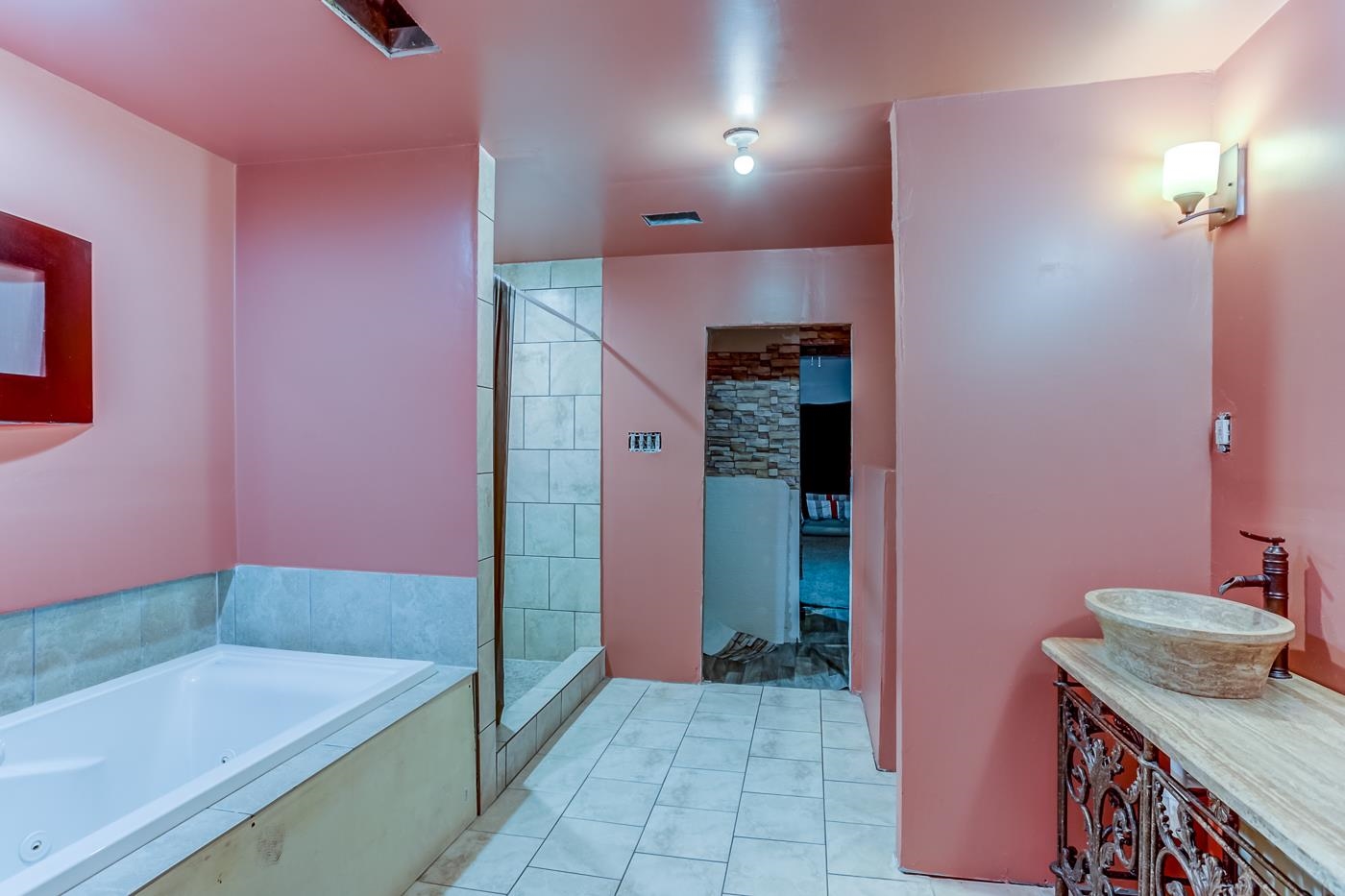 760 Craft Road Memphis, TN 38116 - Photo 17 of 25 a bathroom with a bathtub and a sink