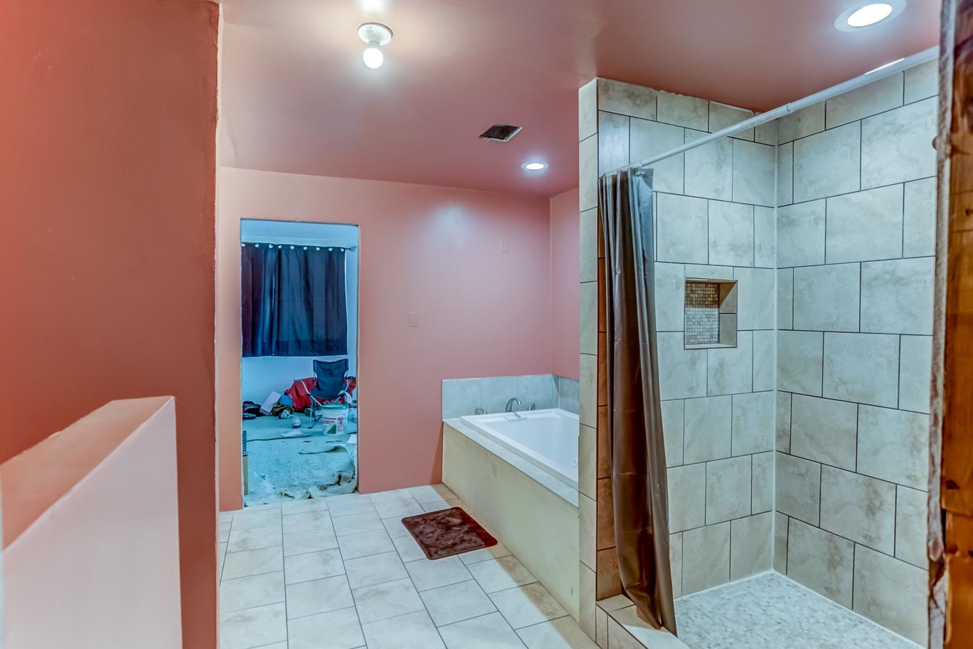 760 Craft Road Memphis, TN 38116 - Photo 18 of 25 a bathroom with a bathtub and shower