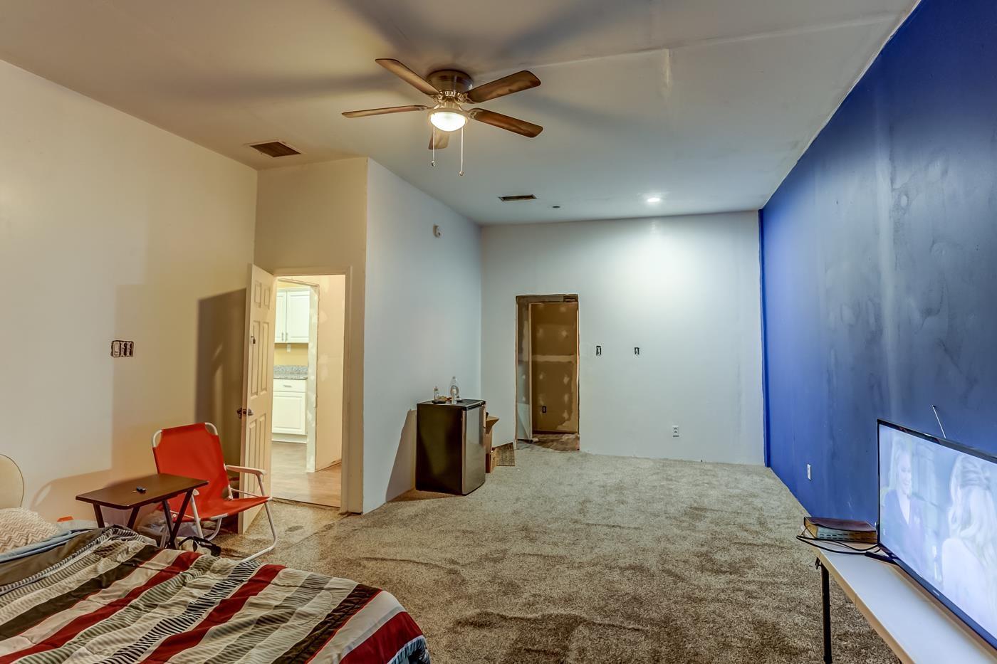 760 Craft Road Memphis, TN 38116 - Photo 19 of 25 a bedroom with furniture and a chandelier