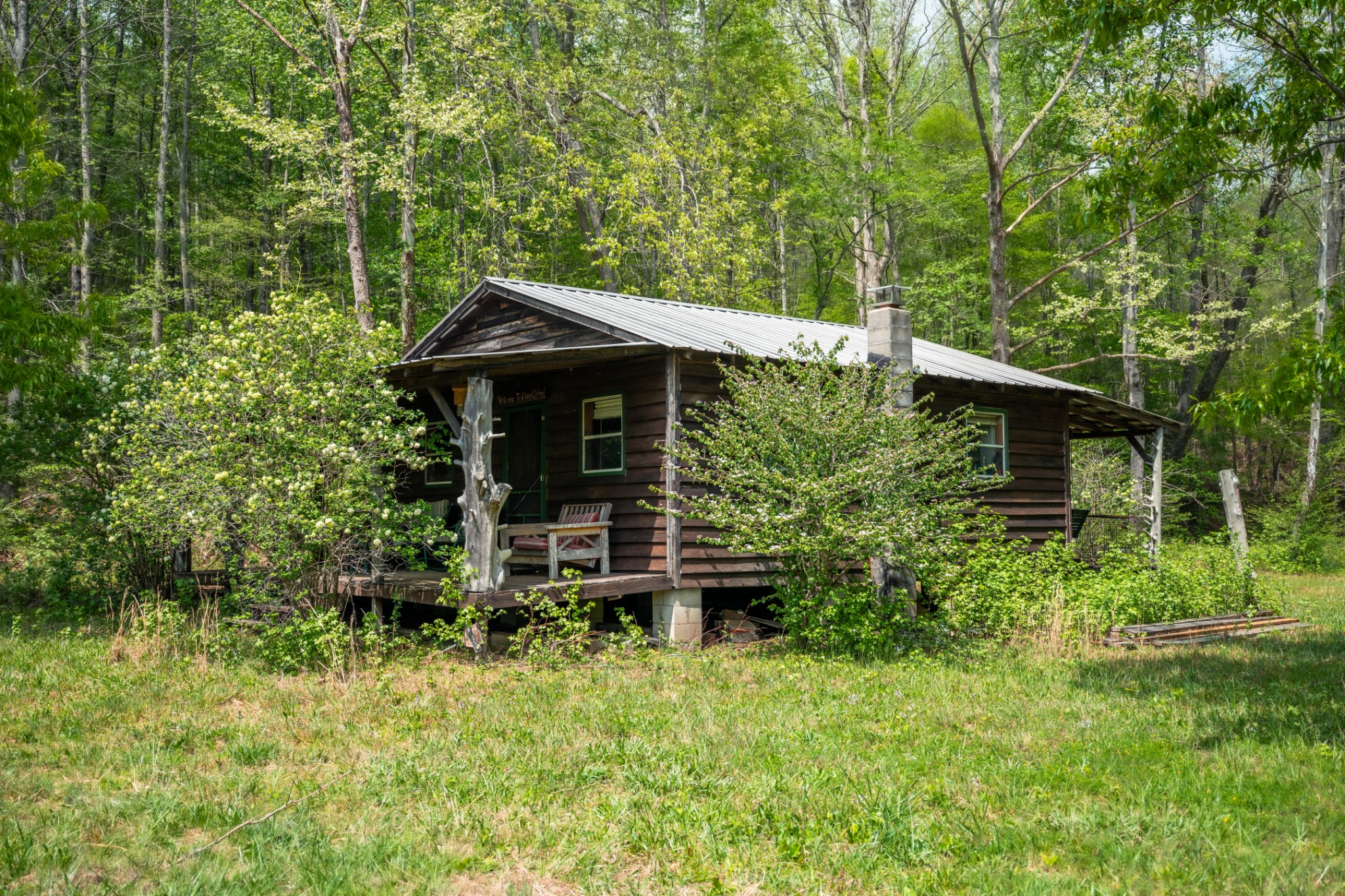 965 Flag Springs Road Lynnville, TN 38472 - Photo 31 of 56 front view of a house with a yard