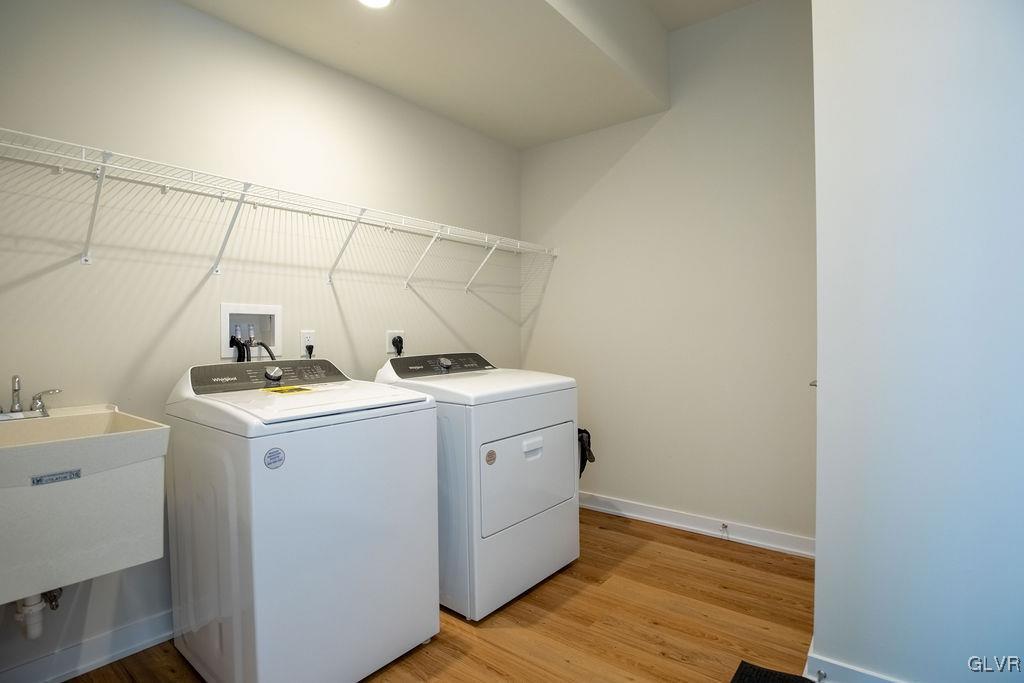 7013 Oak Lane Bath, PA 18014 - Photo 14 of 35 a utility room with dryer and washer