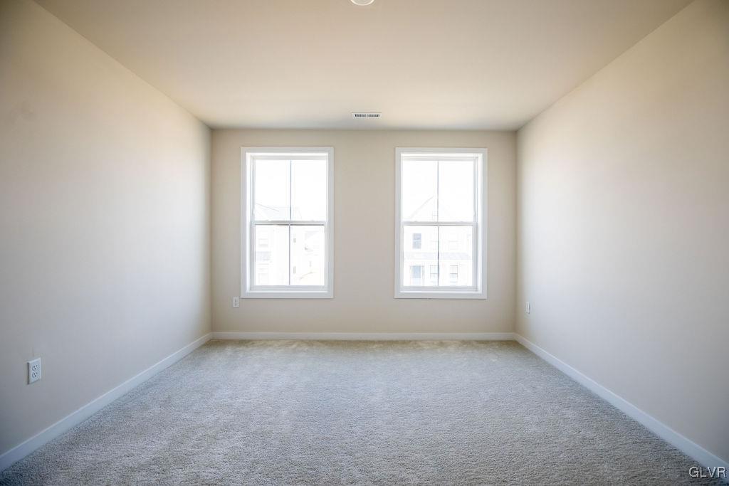 7013 Oak Lane Bath, PA 18014 - Photo 21 of 35 an empty room with windows