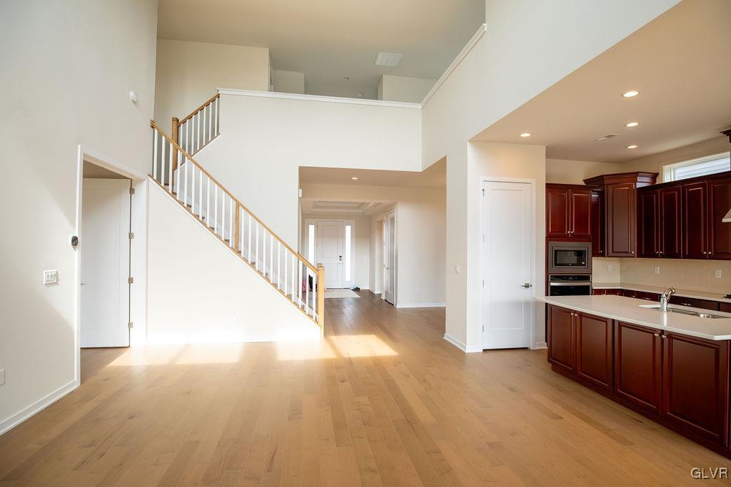 7013 Oak Lane Bath, PA 18014 - Photo 5 of 35 a view of entryway and kitchen with wooden floor