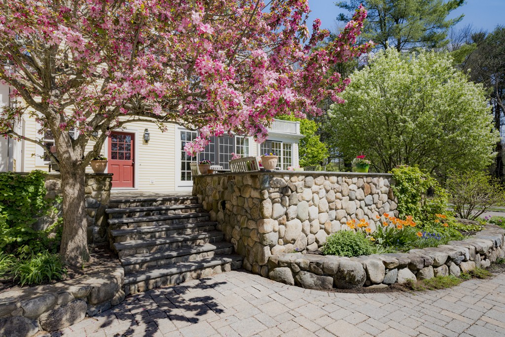 16 Walnut Road Wenham, MA 01984 - Photo 13 of 14 a front view of a house with a tree