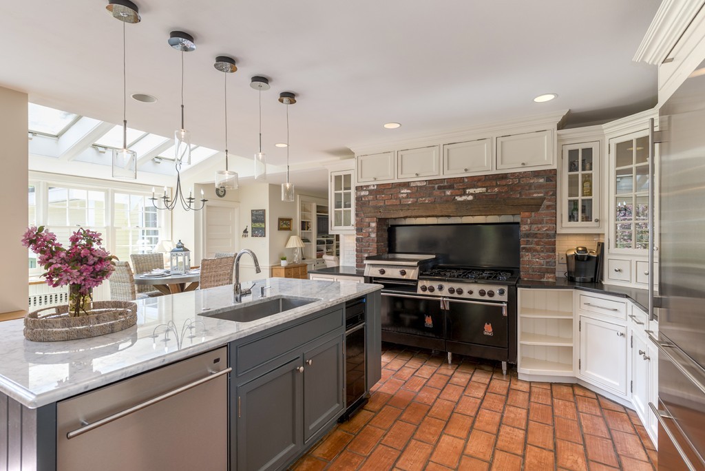 16 Walnut Road Wenham, MA 01984 - Photo 2 of 14 a kitchen with stainless steel appliances a sink a stove top oven a counter space and cabinets