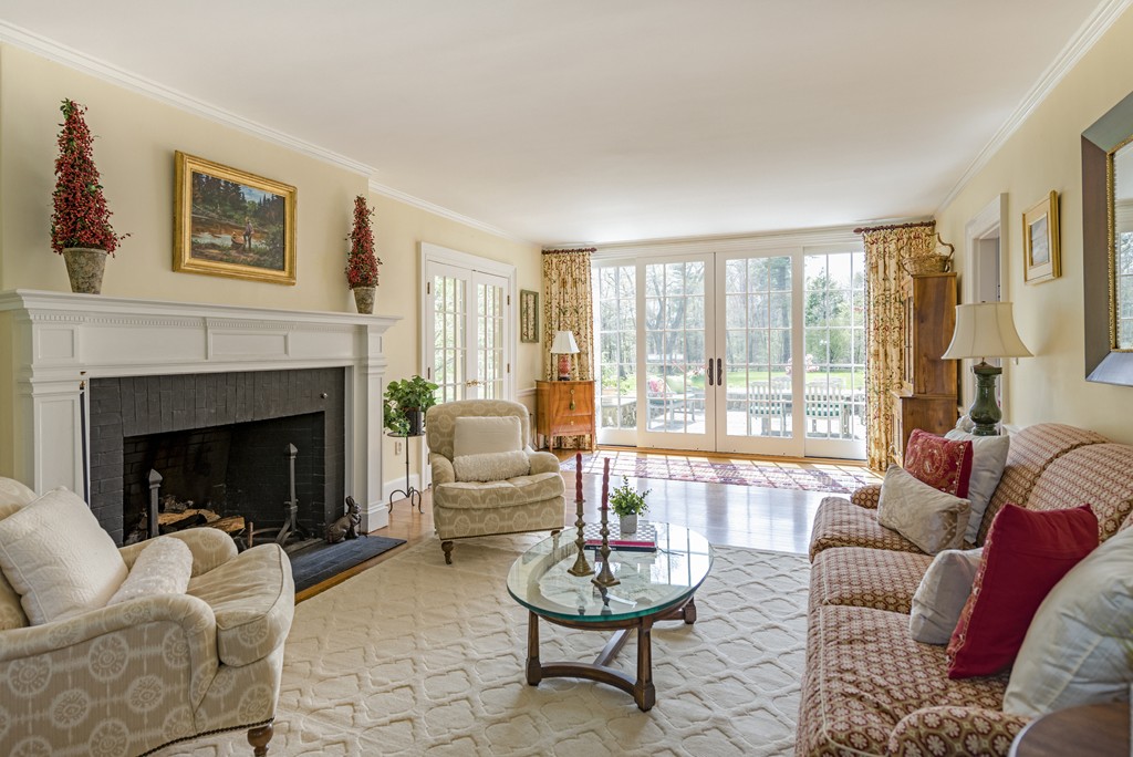 16 Walnut Road Wenham, MA 01984 - Photo 6 of 14 a living room with furniture and a fireplace