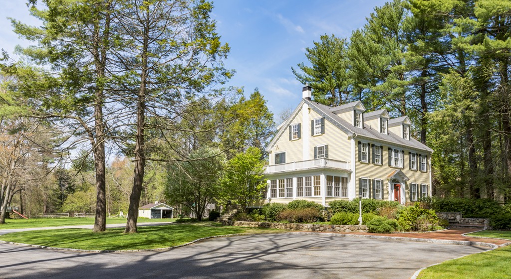 16 Walnut Road Wenham, MA 01984 - Photo 10 of 14 a front view of a house with a garden