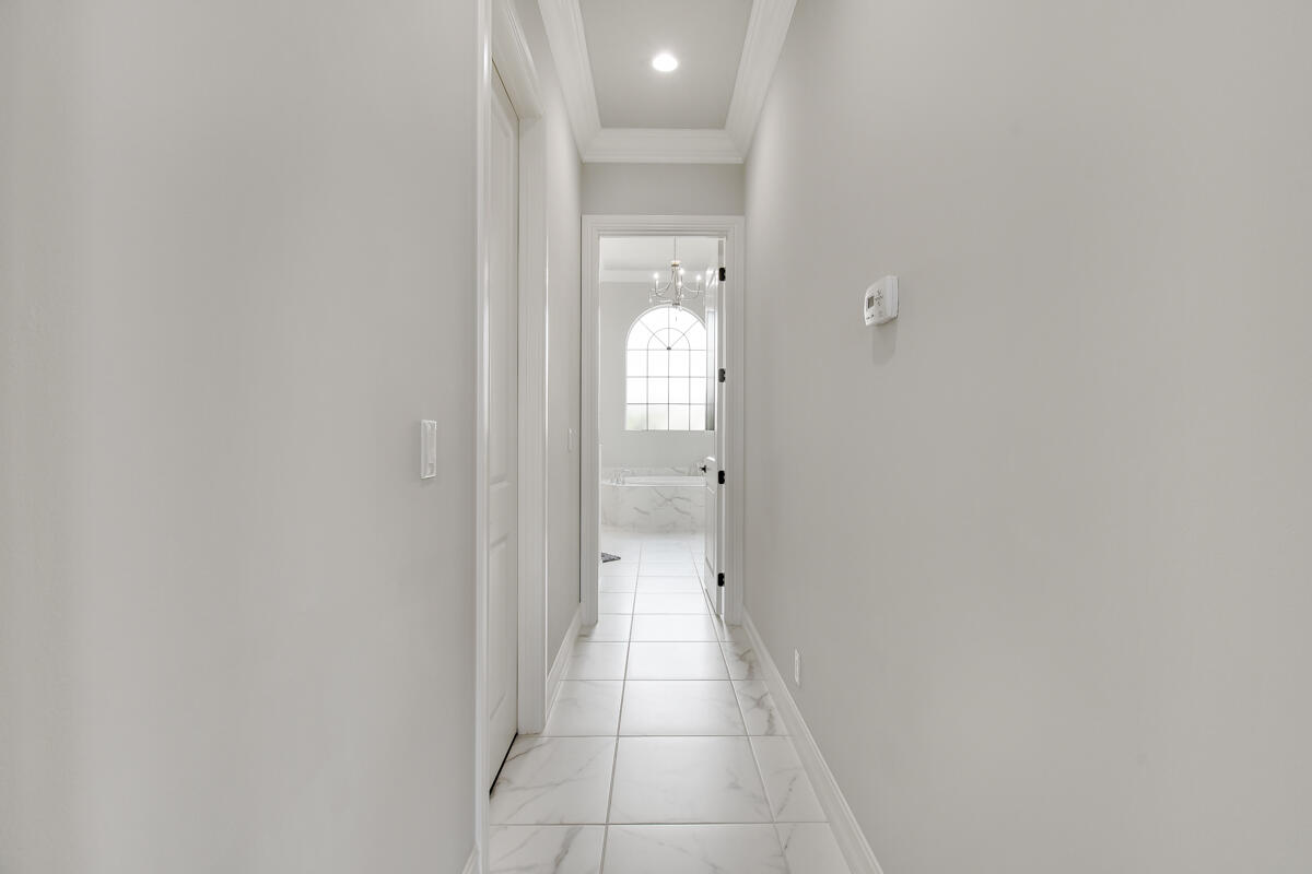 126 Sonata Drive Jupiter, FL 33478 - Photo 31 of 101 Hallway to Primary Bathroom