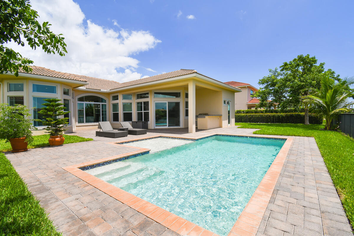 126 Sonata Drive Jupiter, FL 33478 - Photo 54 of 101 Tropical Pool Setting