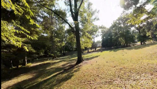 a view of road with yard