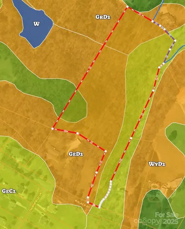 a view of a street with trees on both side of it