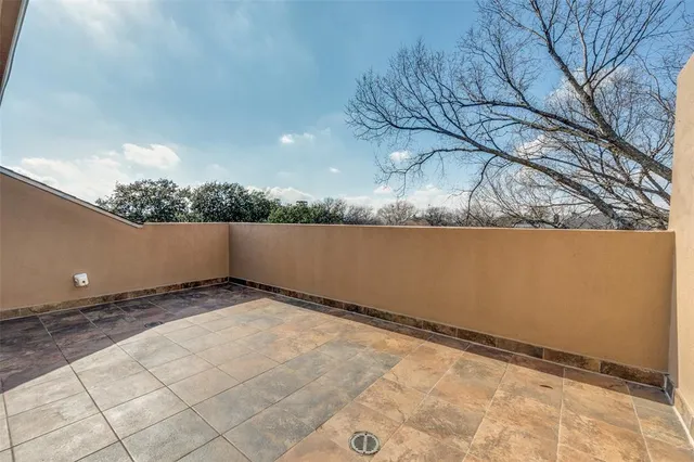 a view of an empty room and mountain view