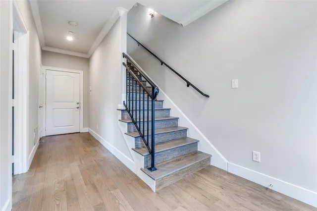 a view of entryway with wooden floor