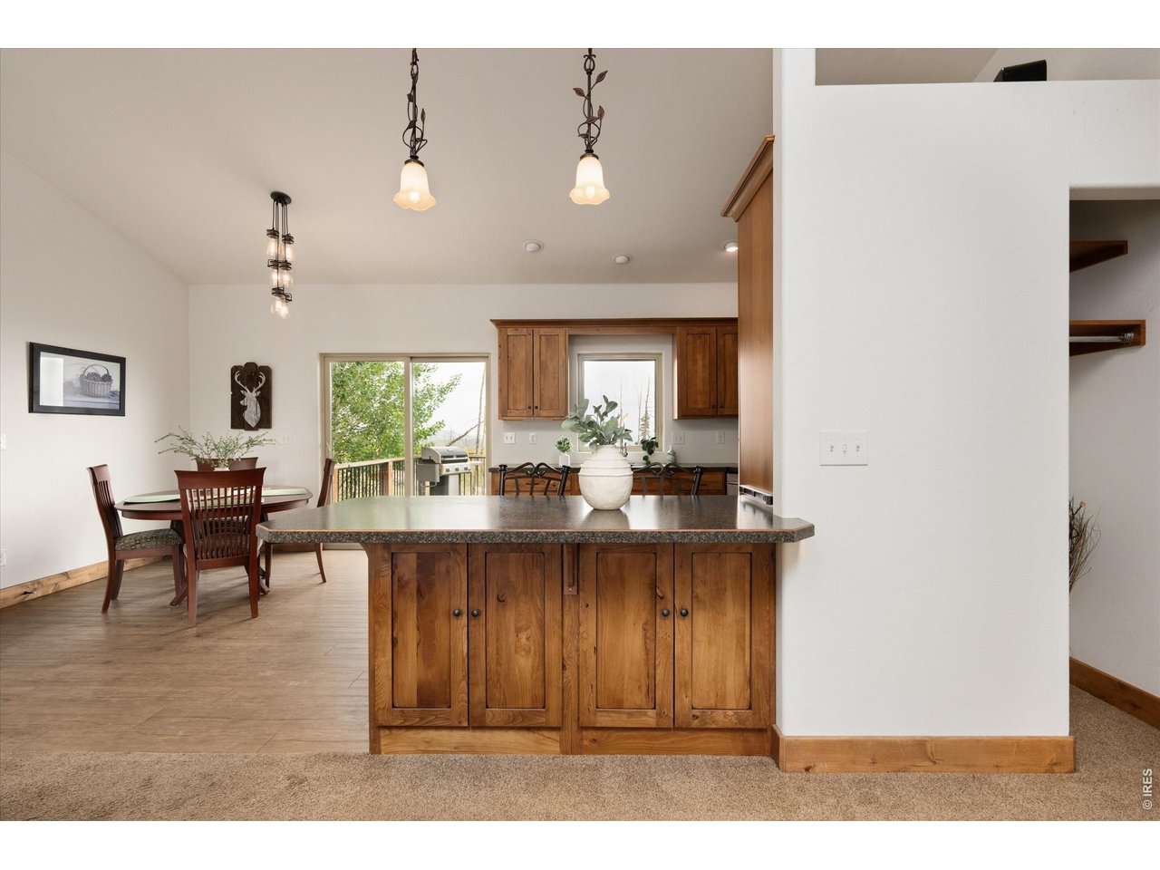 1291 Little Whale Road Bellvue, CO 80512 - Photo 11 of 43 Into the dining area and kitchen