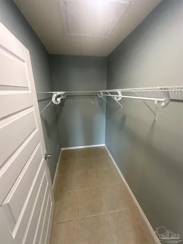 a view of a room with racks on the wall