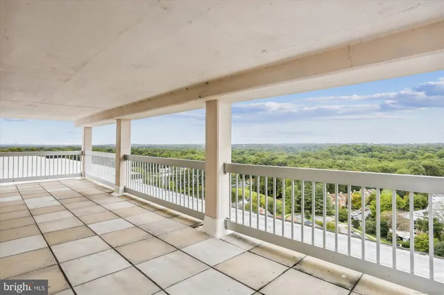 a view of a city street from a balcony