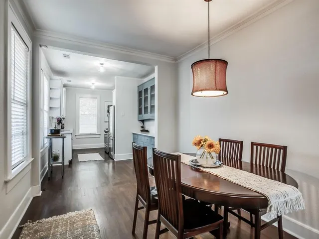 a view of a dining room with furniture