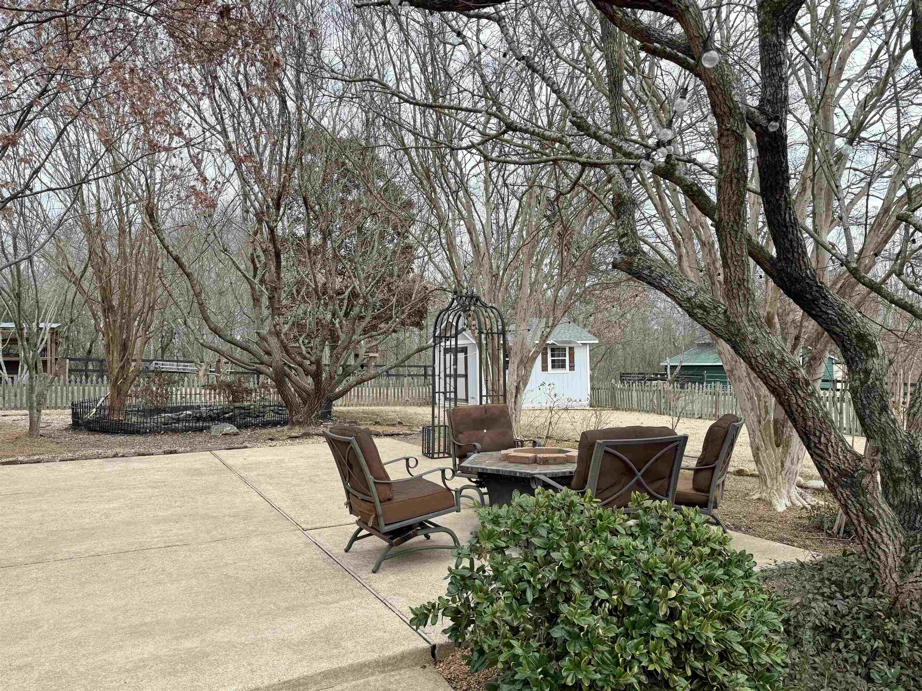 9650 Collierville Arlington Road Arlington, TN 38002 - Photo 30 of 39 Fenced backyard featuring a fire pit and a patio