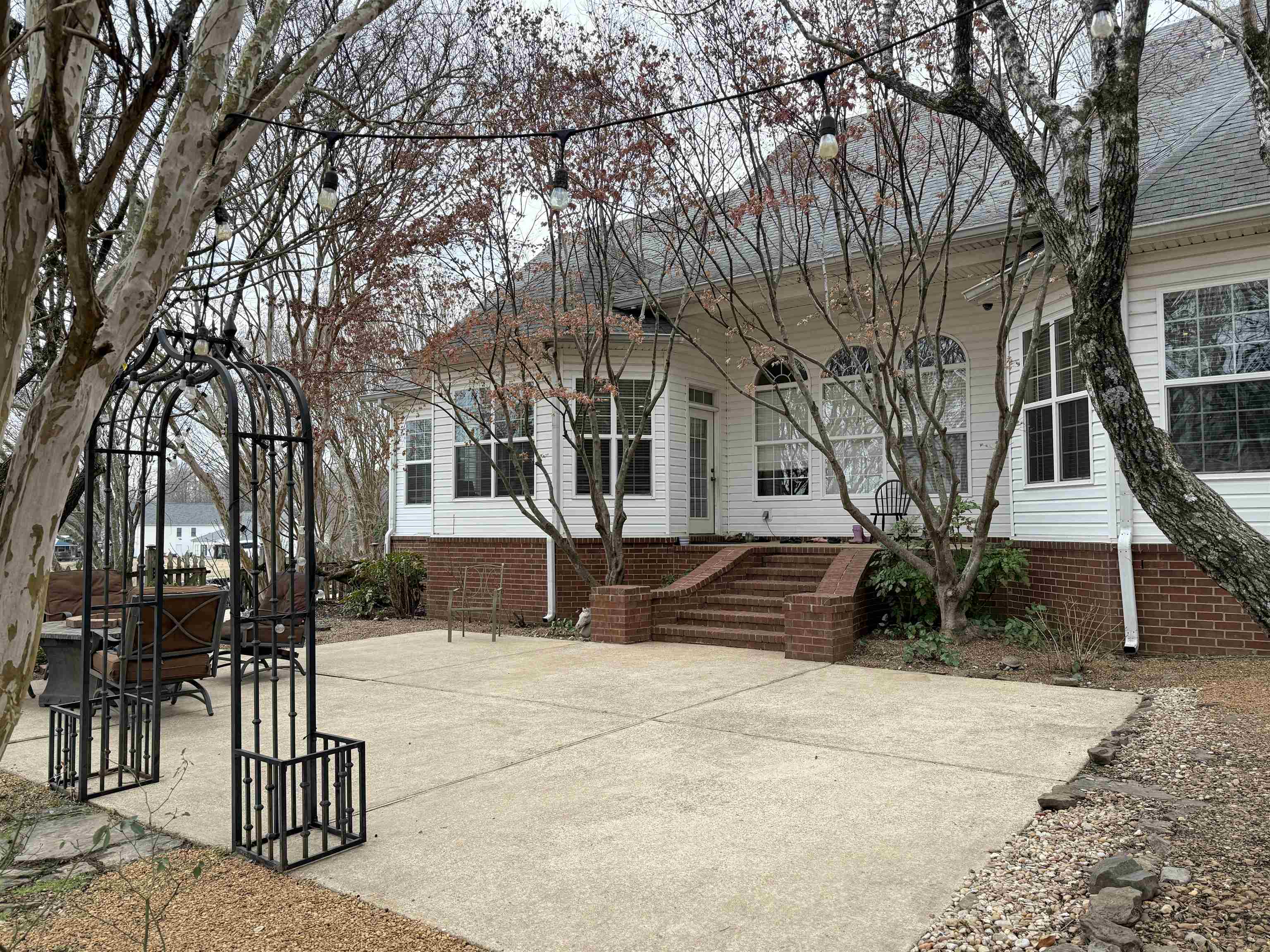 9650 Collierville Arlington Road Arlington, TN 38002 - Photo 34 of 39 Back of house with a patio