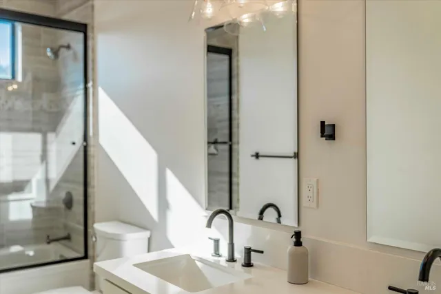 a view of parking garage with cars