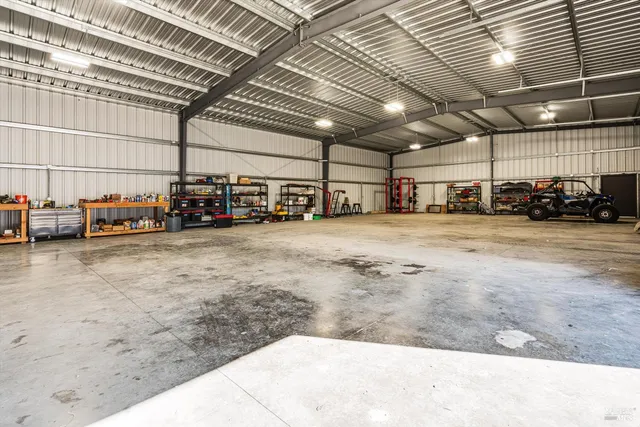 an outdoor space with lounge chair