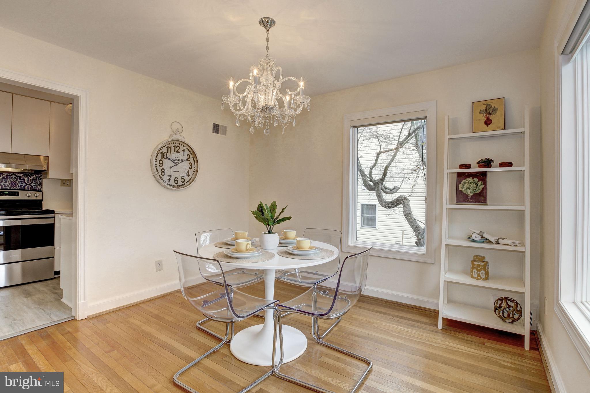 5325 Wakefield Road Bethesda, MD 20816 - Photo 7 of 27 Hardwoods enhance the bright dining room.