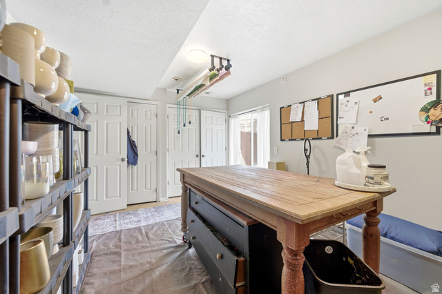 515 Inverness Lane, Unit 207 Heber City, UT 84032 - Photo 19 of 26 Home office with a textured ceiling