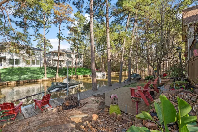 a view of a backyard with sitting area