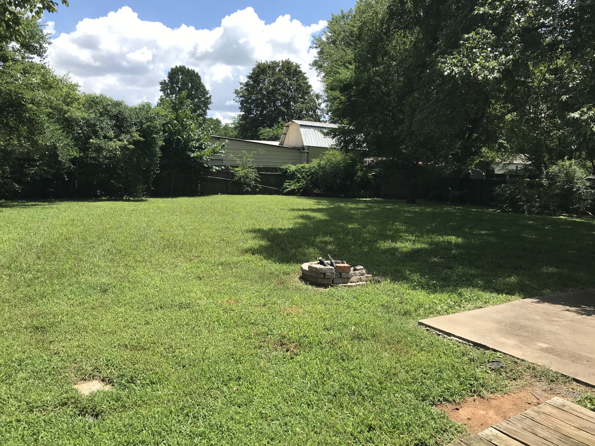 6558 Kari Drive Murfreesboro, TN 37129 - Photo 11 of 12 a view of a table and chairs in the garden