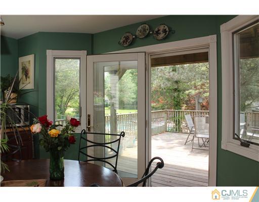36 Runnymede Road Colonia, NJ 07067 - Photo 13 of 25 a view of a living room and dining room