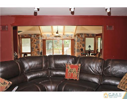 36 Runnymede Road Colonia, NJ 07067 - Photo 14 of 25 a view of a living room and a couch