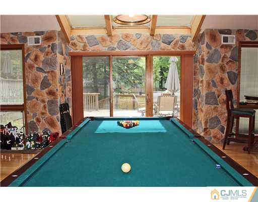36 Runnymede Road Colonia, NJ 07067 - Photo 16 of 25 a view of an chairs and room with an outdoor space