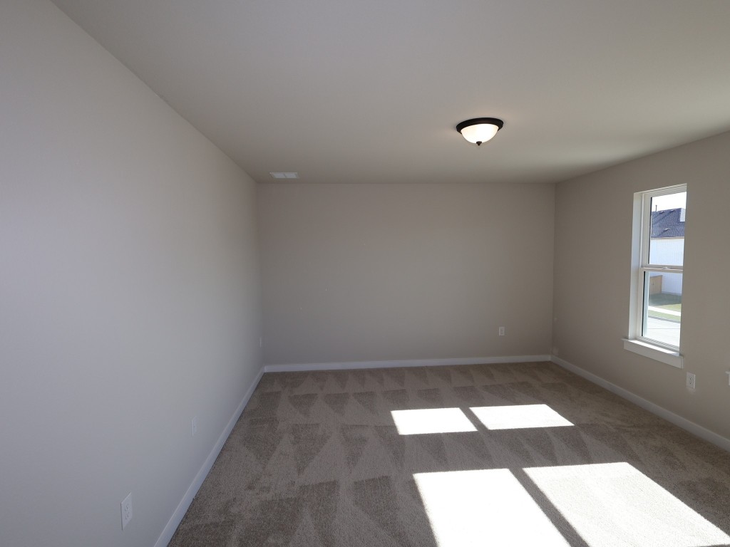 3713 Helena Way Leander, TX 78641 - Photo 18 of 28 an empty room with windows
