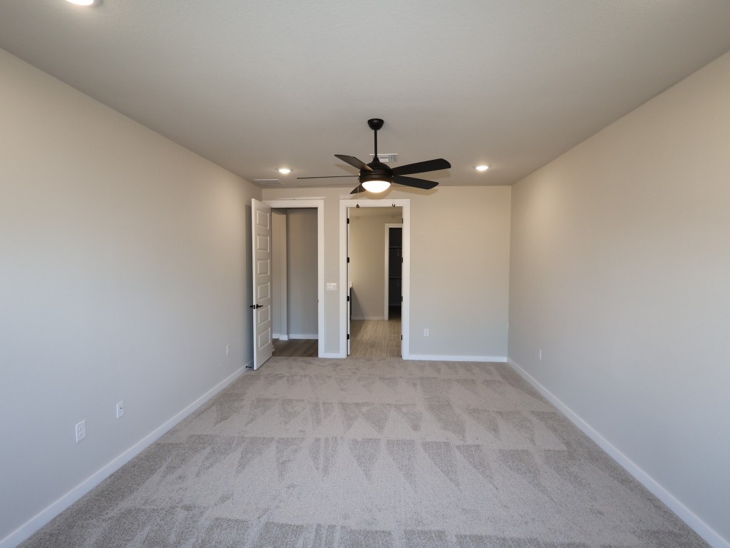 3713 Helena Way Leander, TX 78641 - Photo 9 of 28 a view of empty room with wooden floor