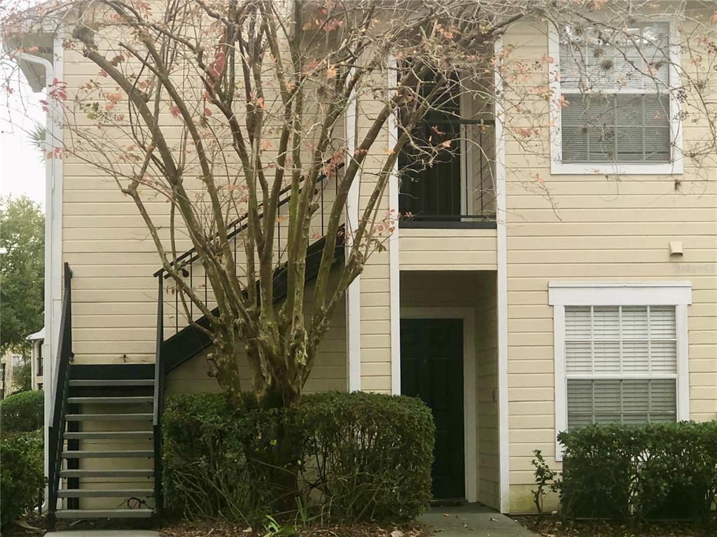 1049 South Hiawassee Road, Unit 3422 Orlando, FL 32835 - Photo 1 of 15 a view of a house with a tree