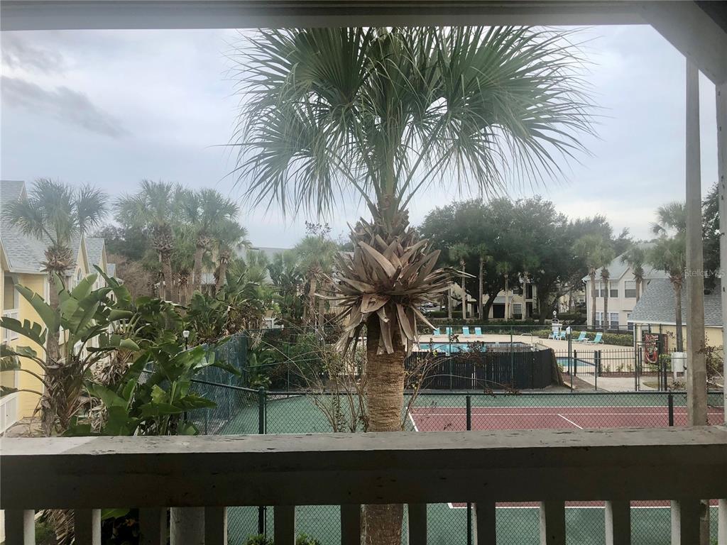1049 South Hiawassee Road, Unit 3422 Orlando, FL 32835 - Photo 12 of 15 a view of outdoor space with palm trees