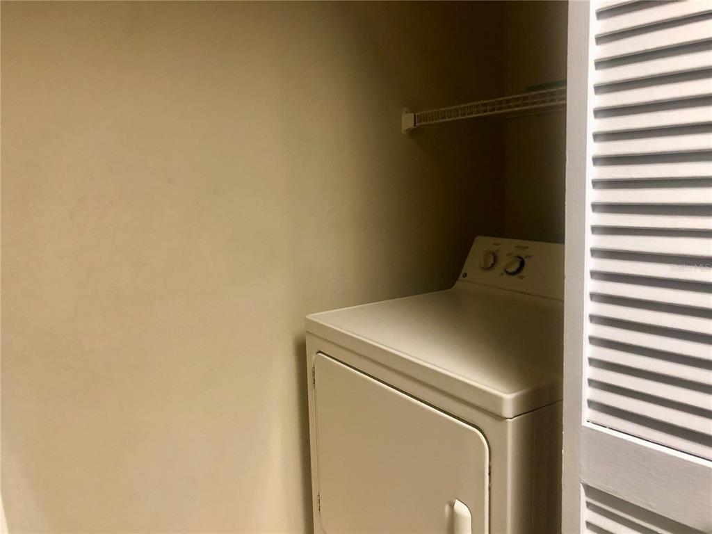 1049 South Hiawassee Road, Unit 3422 Orlando, FL 32835 - Photo 7 of 15 a utility room with dryer and washer