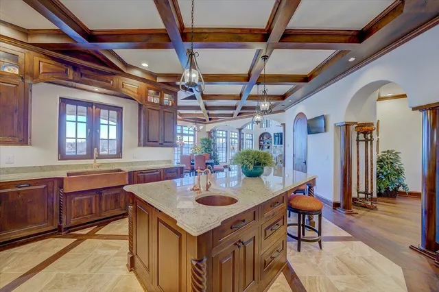 a view of entryway with wooden floor and a front door
