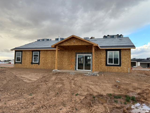 946 East Remington Road Enoch, UT 84721 - Photo 2 of 4 Back of property featuring a covered patio