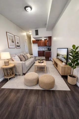 a living room with furniture and a couch