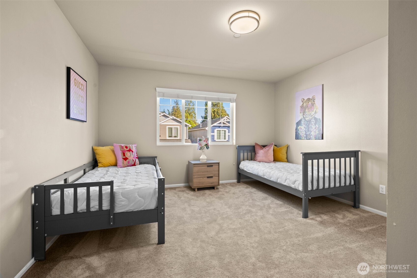 19312 1st Avenue West, Unit 4 Bothell, WA 98012 - Photo 19 of 32 a bedroom with furniture and a window