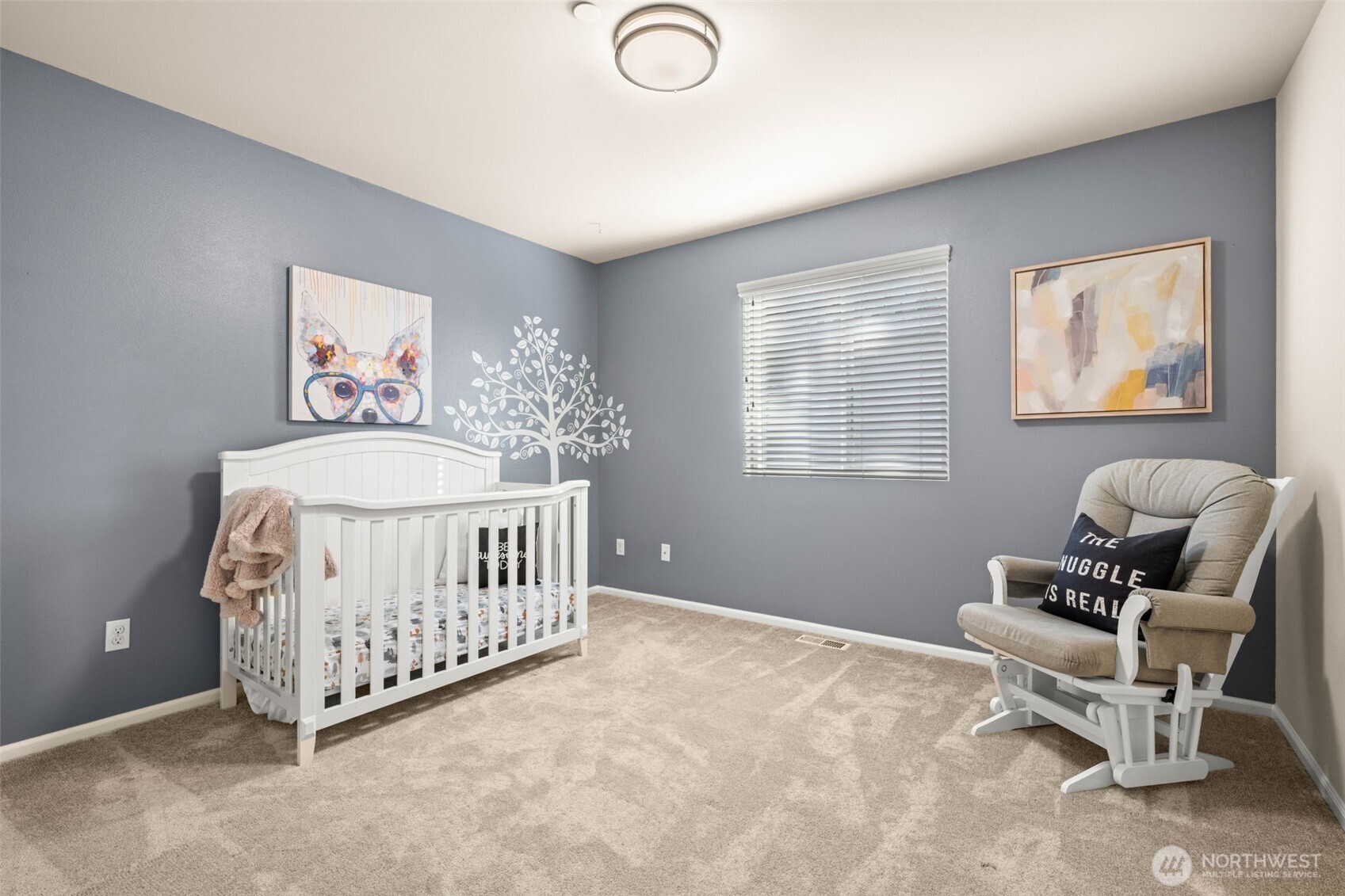 19312 1st Avenue West, Unit 4 Bothell, WA 98012 - Photo 21 of 32 a bedroom with a bed and a window