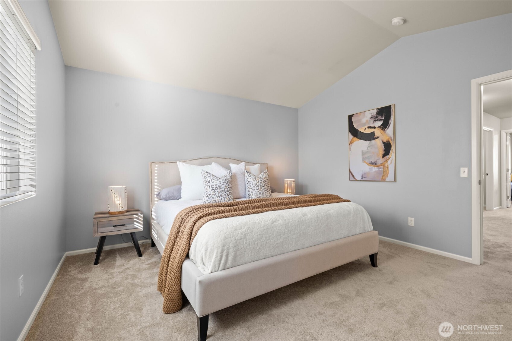 19312 1st Avenue West, Unit 4 Bothell, WA 98012 - Photo 26 of 32 a bedroom with a bed and a window